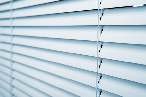 White plastic window blinds close studio shot